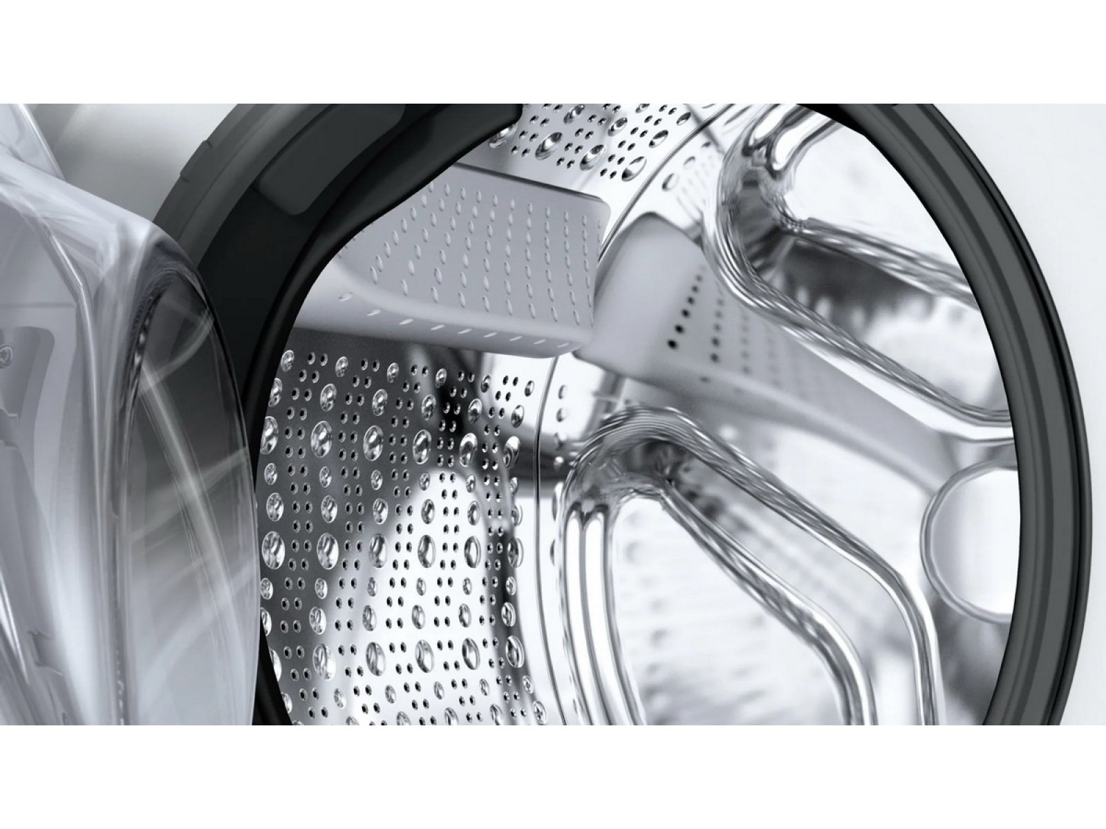 Bosch WAN24200ME барабан крупный план — перфорированные лопасти и внутренняя структура нержавеющего барабана