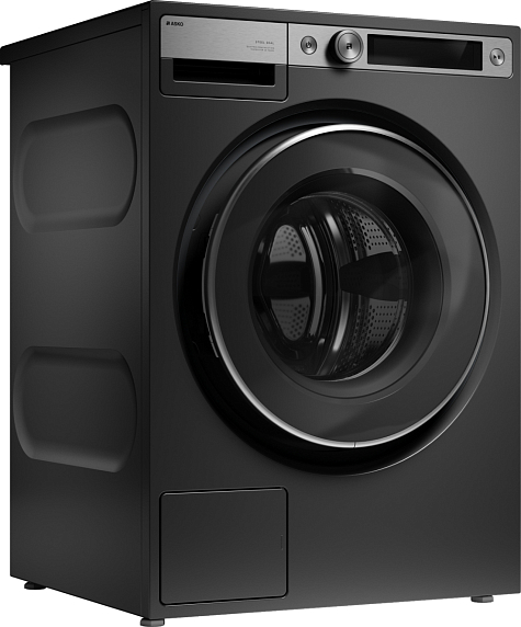 Asko W7096XG вид спереди под углом — минималистичный тонкий корпус чёрного цвета, панель управления вверху