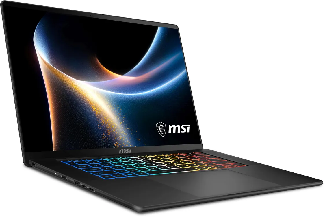 MSI Stealth 16 AI+ B3WI-012RU вид спереди под углом с RGB-подсветкой клавиатуры